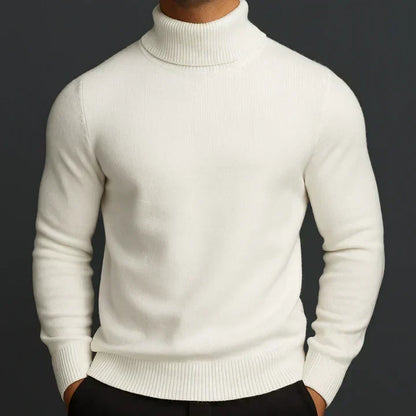 Model wearing a cream-white ribbed-collar turtleneck jumper, hands in pockets, seen from the front 1