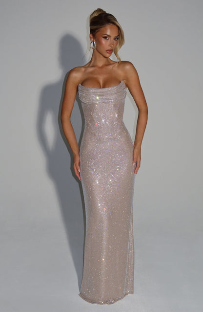 Front view of the strapless rhinestone dress in a pale champagne shade, fully covered in glittering stones. 15