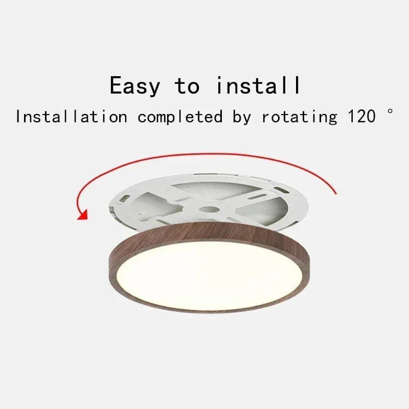 Dark wood-effect ceiling light beside its white mounting bracket, with a red arrow showing the twist-on installation. 1