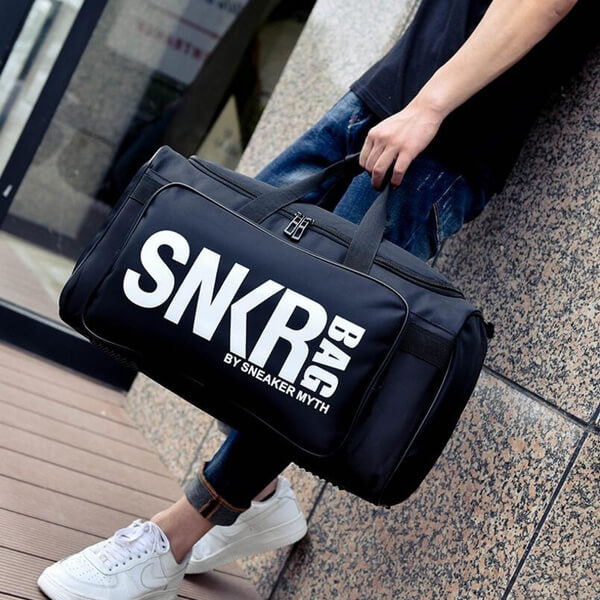 Waterproof multi-compartment travel bag for trainers and gear