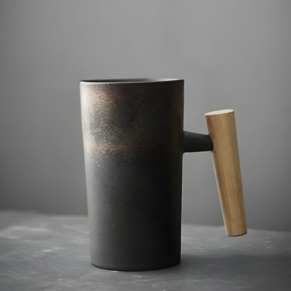 Charcoal stoneware mug with a rust-brown gradient near the rim and a light wooden handle 4