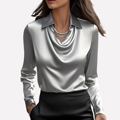 Model wearing the silver-grey satin blouse with a shiny cowl neckline and collar, with layered necklaces 8