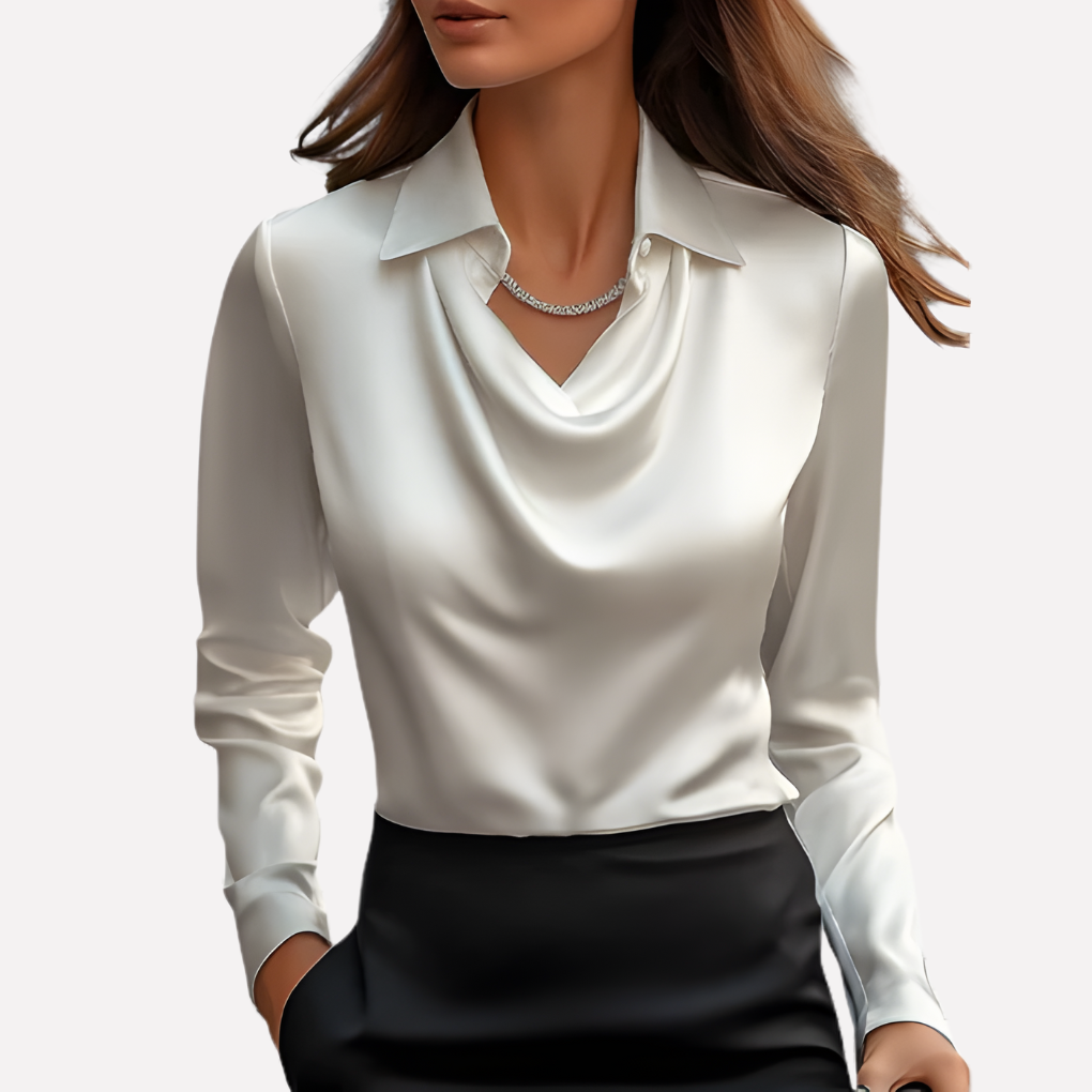Model wearing the white satin blouse with a draped cowl neckline and collar, paired with a black skirt 1