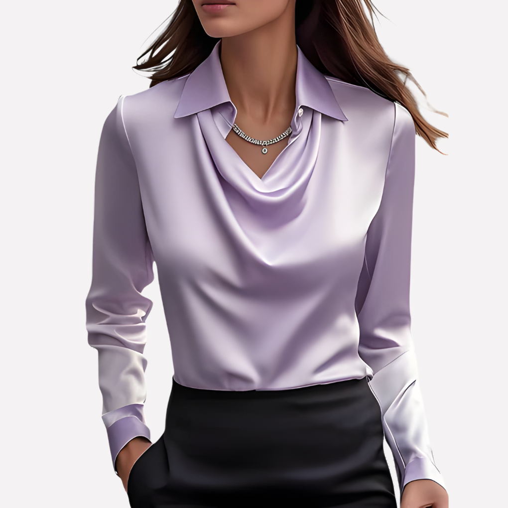 Model wearing the lilac satin blouse with a draped cowl neckline, button cuffs and a delicate pendant necklace 7