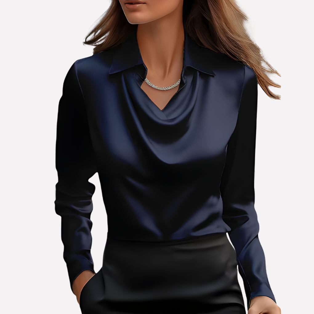 Model wearing the navy satin blouse with a draped cowl neckline, collar and long sleeves over a black skirt 3