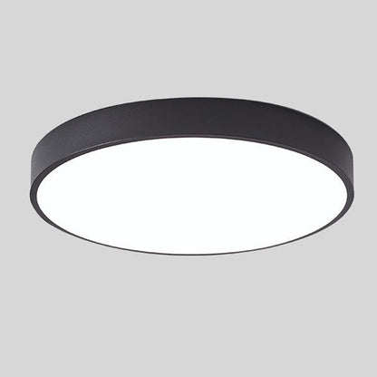 Black round slim ceiling light with no wood accent, shown from below at an angle on a plain grey background. 11