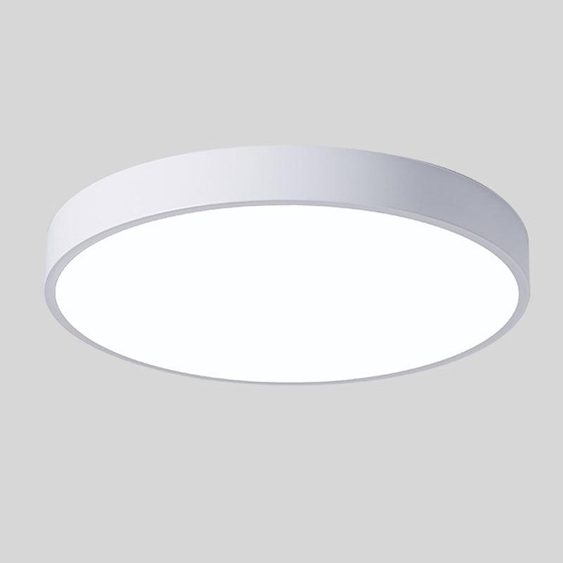 White round slim ceiling light with no wood accent, shown from below at an angle on a plain grey background. 12