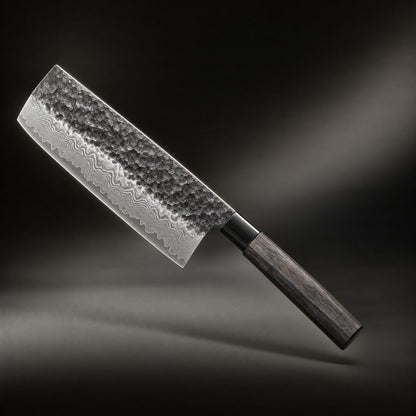 Rectangular-bladed knife angled diagonally against a dark studio backdrop, showing its hammered upper blade, rippled layered-steel edge and dark octagonal woode 1
