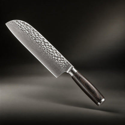 Santoku knife angled diagonally against a dark backdrop, showing its hammered, rippled steel blade and dark wooden handle 1