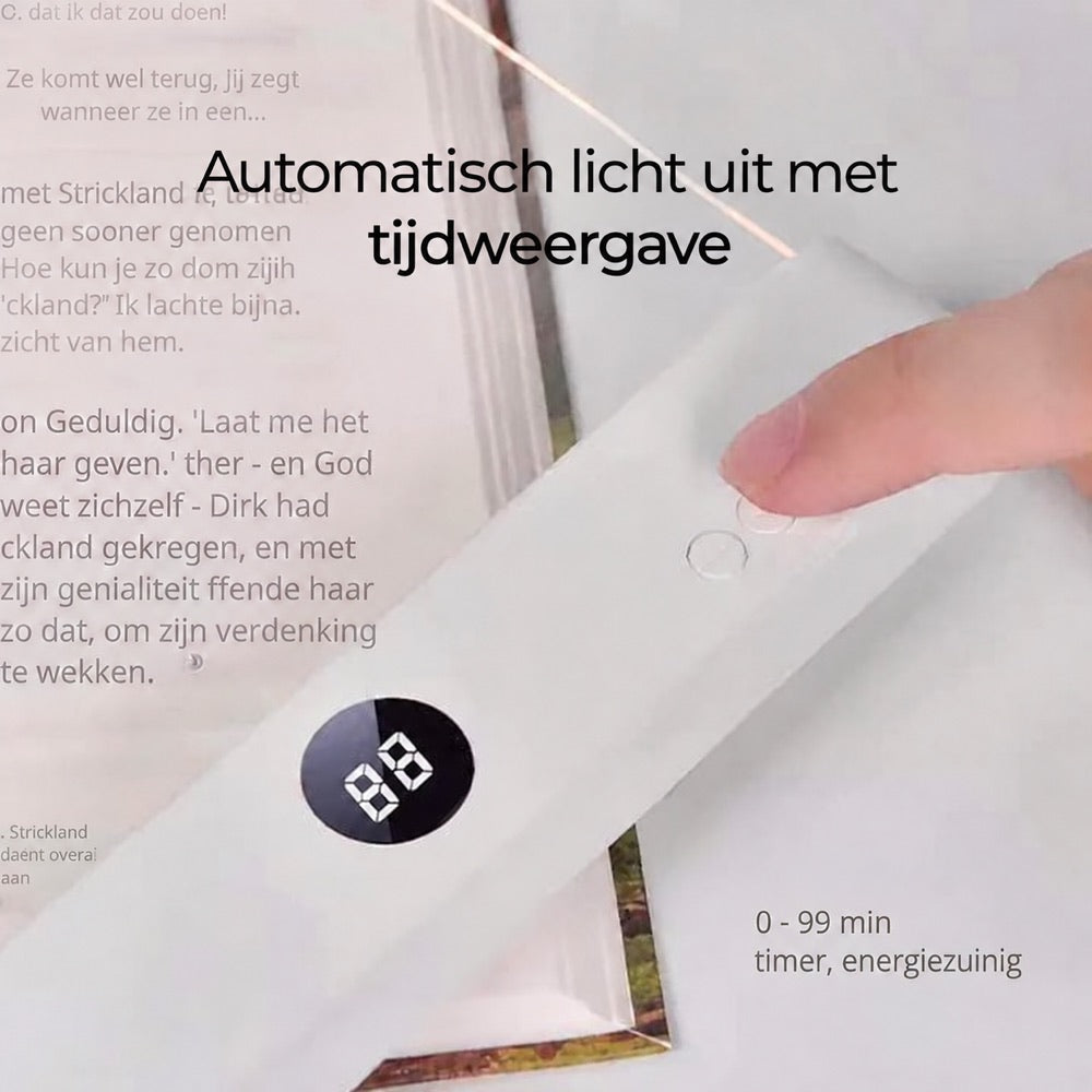Finger pressing a button on the lamp's base beside a small display, resting on an open book 9