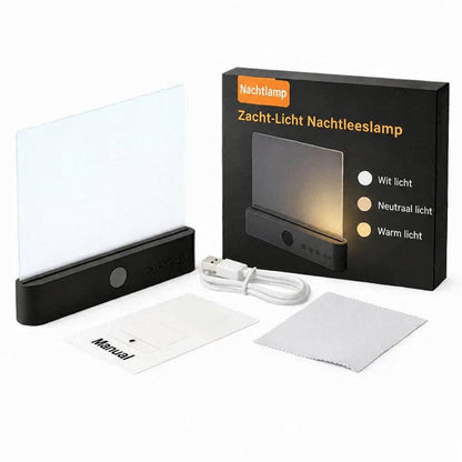 Black lamp with its retail box, USB charging cable, instruction manual and cleaning cloth laid out 13