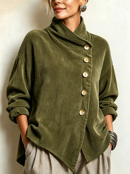 Close-up front view of the olive green ribbed corduroy sweater with its asymmetric row of gold-toned buttons and draped high collar. 1