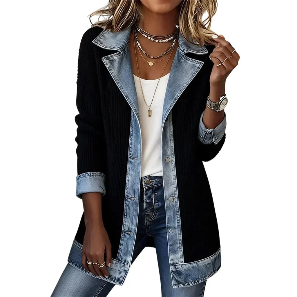 Front view of the black ribbed knit coat with denim lapels and hem, worn open over a white top 13