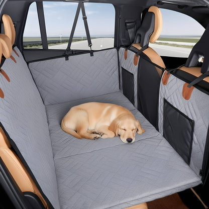 Grey version of the seat extender with a golden dog curled up asleep on it, mesh side pockets visible. 12