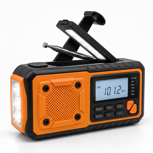 Orange and black radio on white background, crank handle, reading light and antenna raised, side torch lit 1