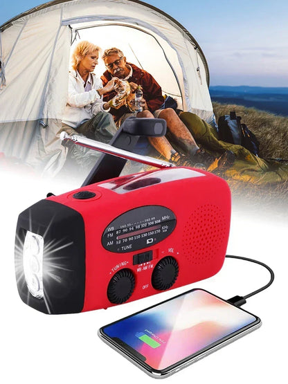 Older couple resting outside a tent, with the lit radio charging a phone in the foreground 4