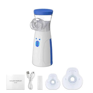 Nebuliser unit laid out with its contents: USB charging cable, instruction booklet, mouthpiece and two soft masks in different sizes. 9