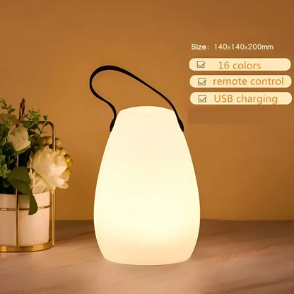 Rounded vase-shaped lamp with black strap beside a flower pot, with feature list and size 8