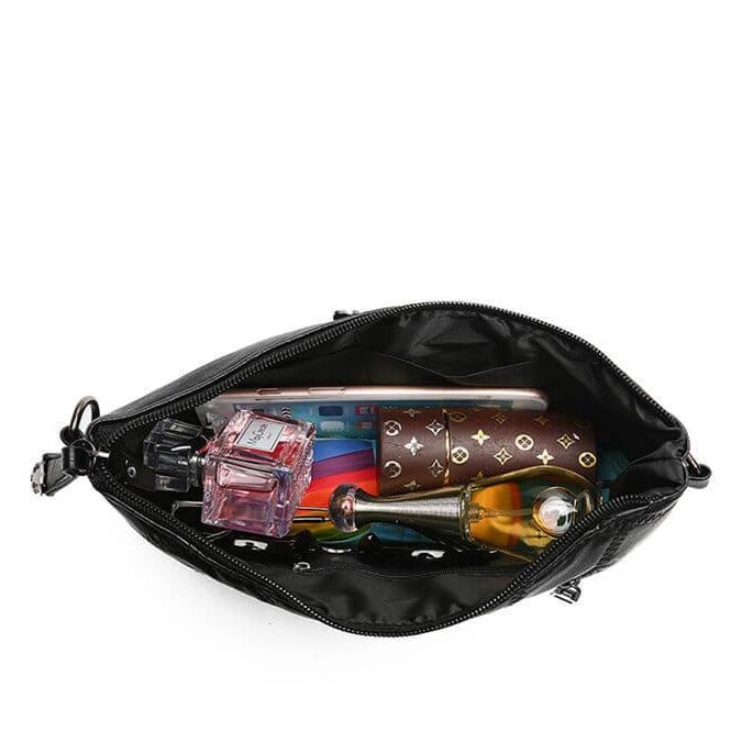 Women's PU-leather crossbody clutch with a spacious interior.