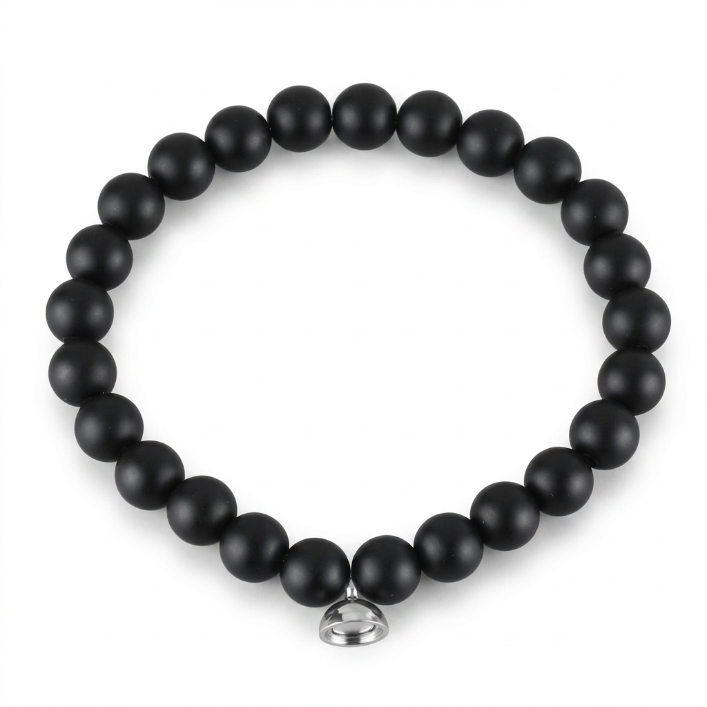Matte black beaded bracelet with silver charm, cleanly lit on a plain white background 5