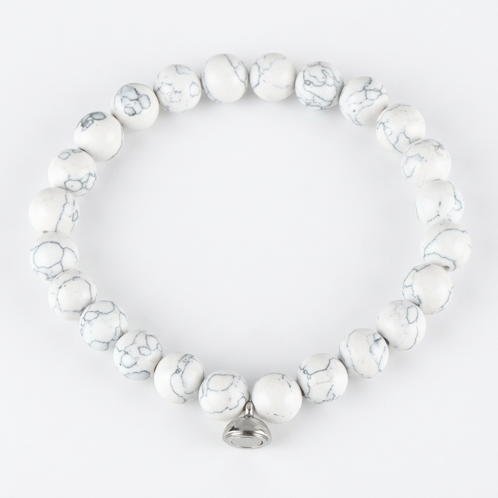 White marbled beaded bracelet with grey veining and a small silver charm, on a white background 6