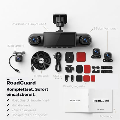 Flat lay of the full kit: main unit, rear camera, two side cameras, cables, adhesive mounts and a user manual. 6