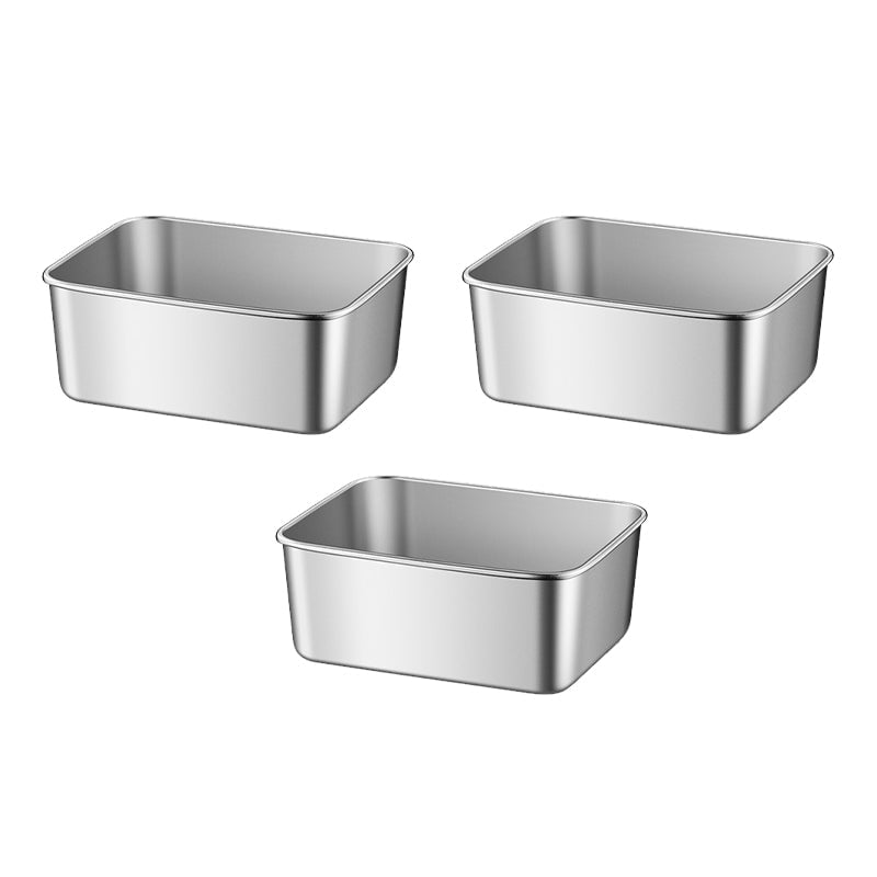 Three empty rectangular stainless steel containers without lids, arranged in a triangle on a white background. 12