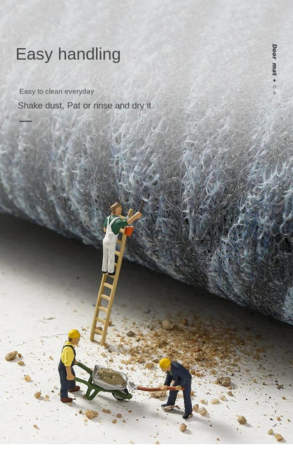 Close-up of the loose looped pile, with miniature workers clearing spilled dirt, illustrating easy cleaning 12