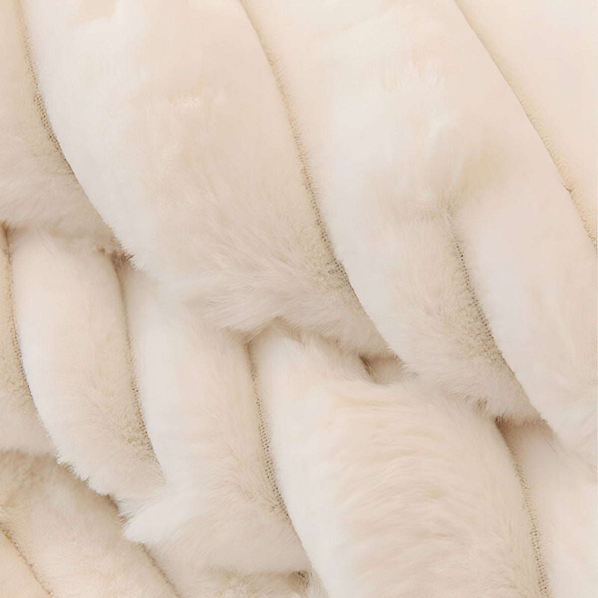 Extreme close-up of the cream faux-fur pile, showing the soft raised stripes and fine, dense fibres. 3
