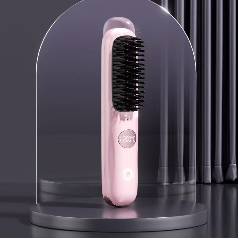Pale pink brush with black bristles standing on a round plinth inside a clear glass dome, with a round touch power button. 12