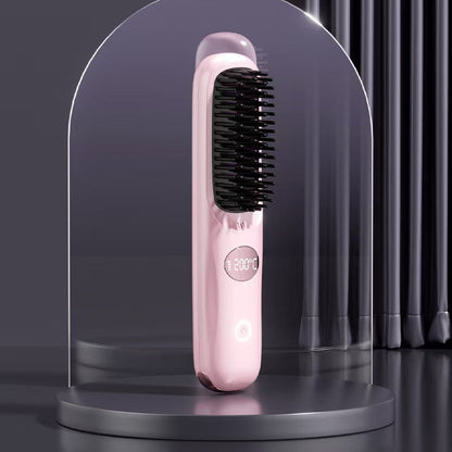 Pale pink brush with black bristles standing on a round plinth inside a clear glass dome, with a round touch power button. 12