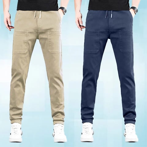 Two models side by side wearing the trousers in beige and navy with drawstring waists 21