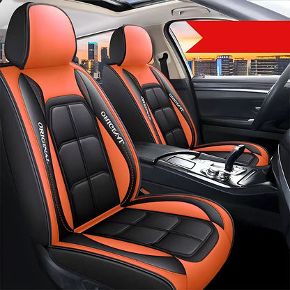 Front seat covers in black and orange with a quilted back panel, fitted to both front seats, with a red banner at top right. 15