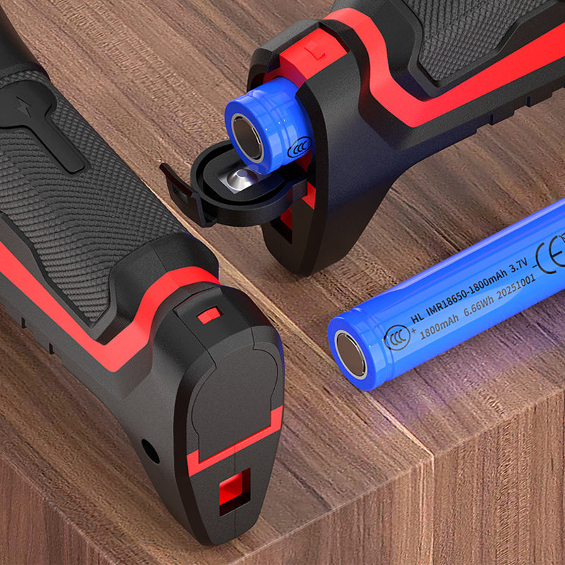 Battery compartment at the base of the handle open, with a blue rechargeable cell removed and lying on a wooden surface 6