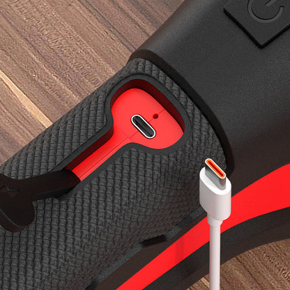 Close-up of the grip's open red port cover showing the USB-C charging socket, with a white USB-C cable beside it 5