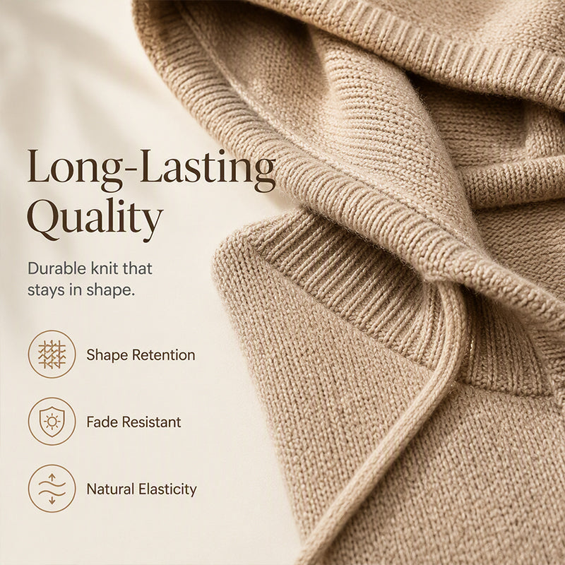 Close-up of the taupe knit's folded hood and ribbed trim, showing the fine stitch texture. 6