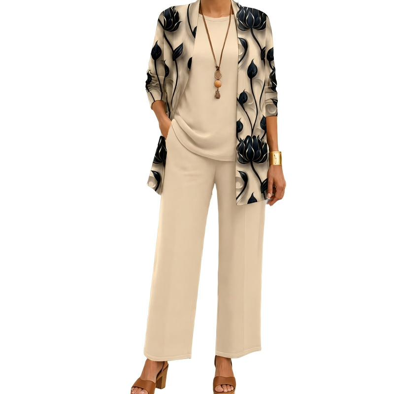 Model wearing the beige set: black lotus-print open cardigan, plain round-neck top and wide-leg trousers, with a pendant necklace and gold cuff. 1
