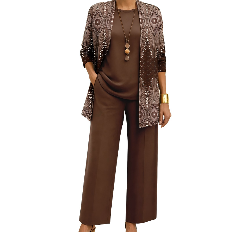 Model wearing the brown set, the cardigan in a sparkling diamond-shaped pattern over a plain brown round-neck top and wide-leg trousers. 10