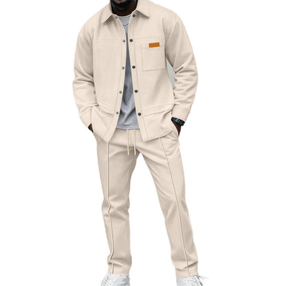 Model wearing the set in cream, with chest pocket shirt and drawstring trousers with front seams 3