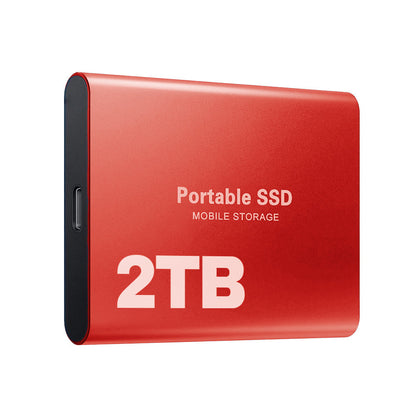 Red version of the drive viewed at an angle, showing its rounded metal edges and Type-C port on the short side. 8
