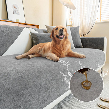 Golden retriever lying on a grey cover, with water splashes and a round inset of liquid beading on the fabric. 9