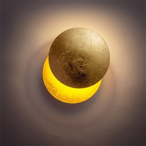 Close-up of the gold front disc with a bright golden crescent glowing beneath it 5