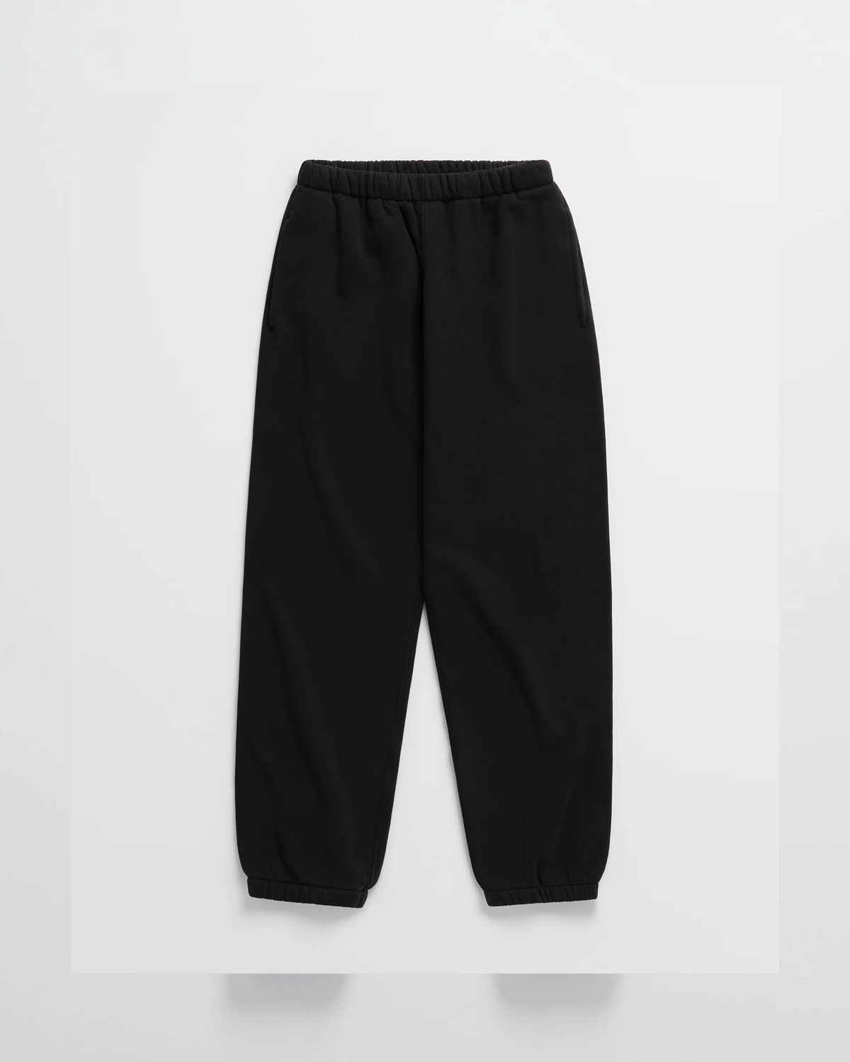 Flat lay of black joggers with an elasticated waistband, side pockets and gathered ankle cuffs. 10