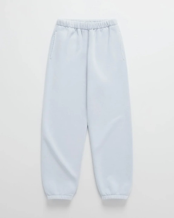 Flat lay of pale blue joggers with an elasticated waist, side pockets and fitted cuffs at the ankles. 9