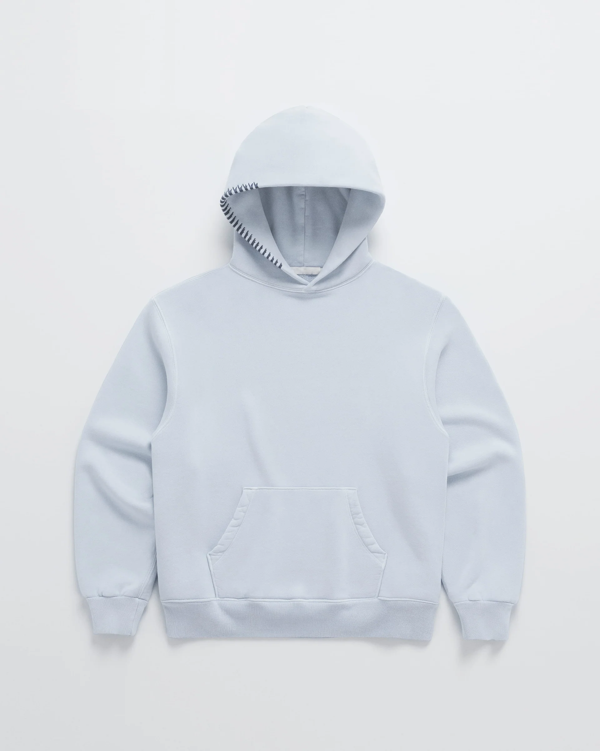 Flat lay of the pale blue hoodie with a front pocket and dark navy stitching detail along the hood edge. 4