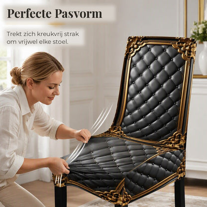 Woman smoothing a black quilted cover with gold baroque trim over a dining chair, showing how snugly it stretches. 3