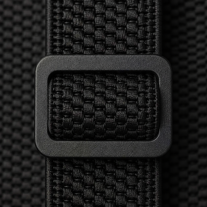 Close-up of a black plastic slide adjuster threaded onto the woven elastic strap 4