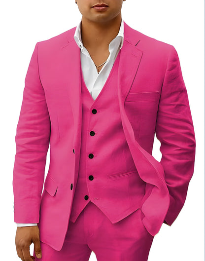 Model wearing the suit in vivid fuchsia pink, with black buttons and a white open-collar shirt. 12