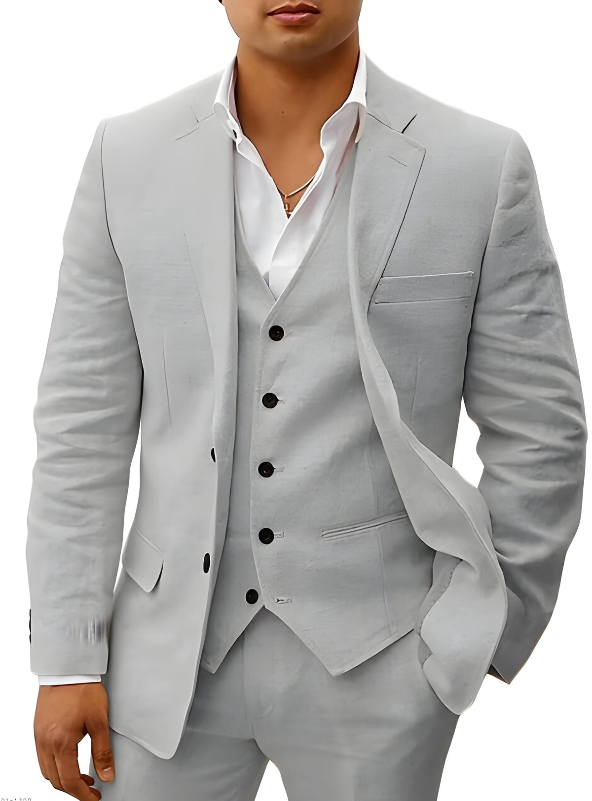 Model wearing the suit in light grey, with black buttons on the vest and jacket and one hand in pocket. 13