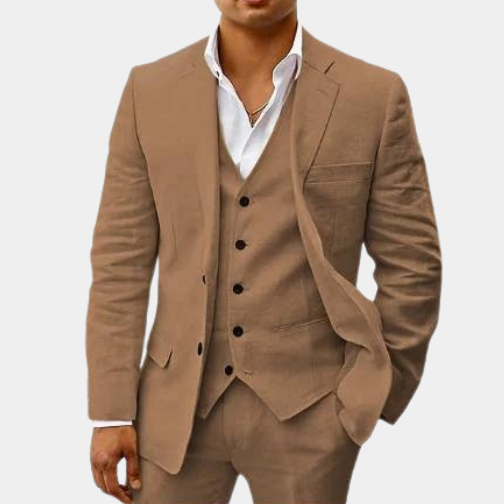 Model wearing the suit in a camel-brown shade, with black vest buttons and a white open-collar shirt. 2